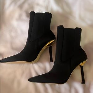 Good American 9.5 black high heeled neoprene boots